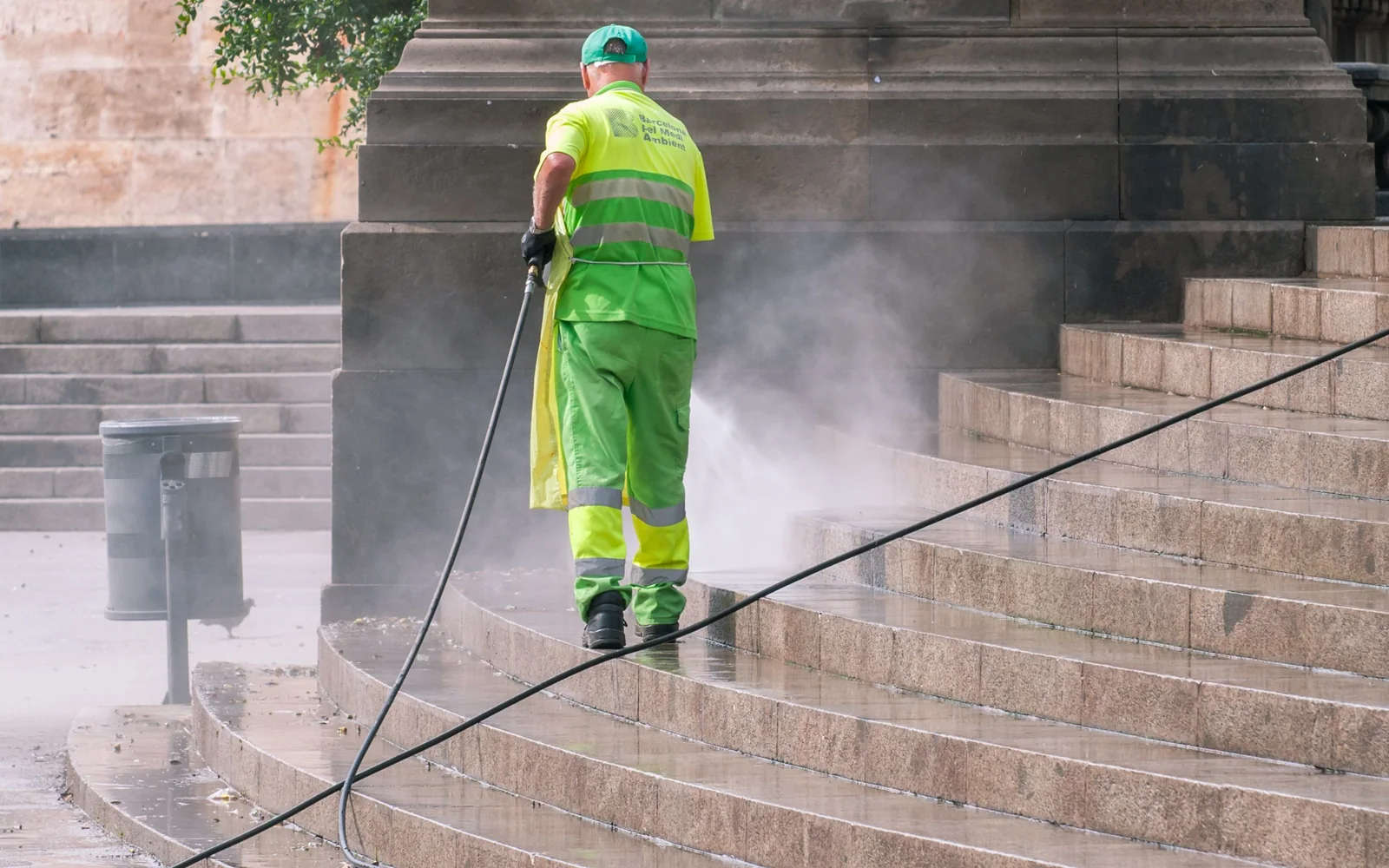 Professional pressure washing of exterior stone steps
